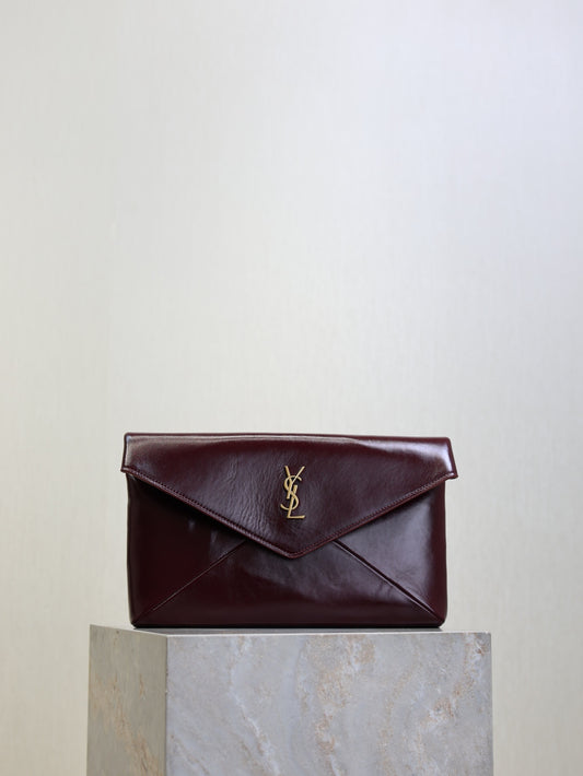 YSL CASSANDRE large envelope pouch in shiny leather