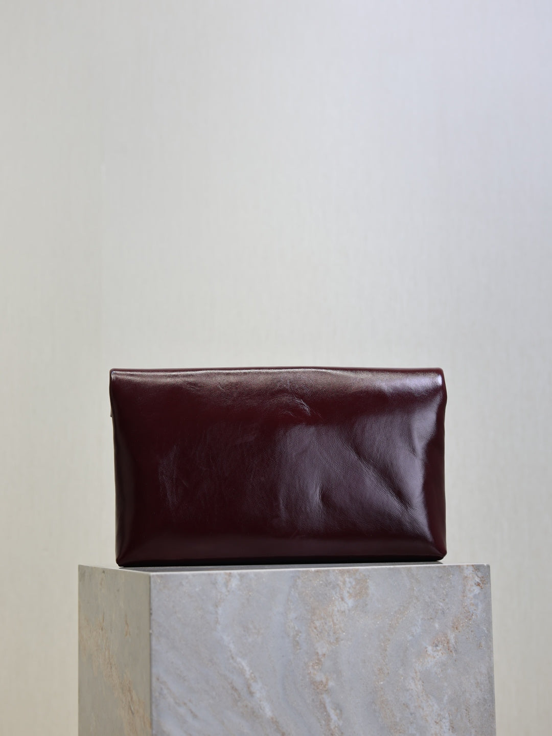 YSL CASSANDRE large envelope pouch in shiny leather