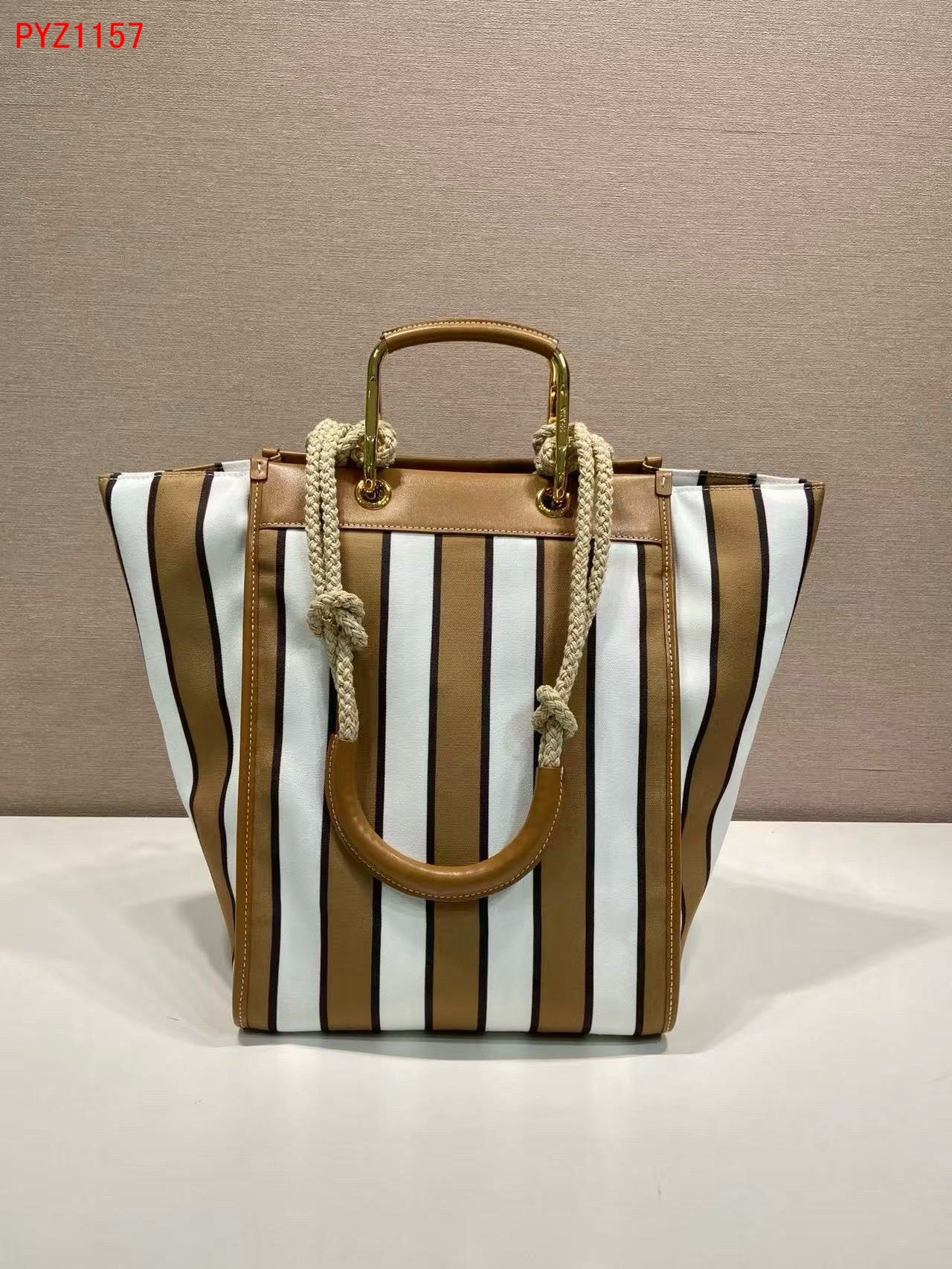 Prada Large printed canvas and leather tote bag