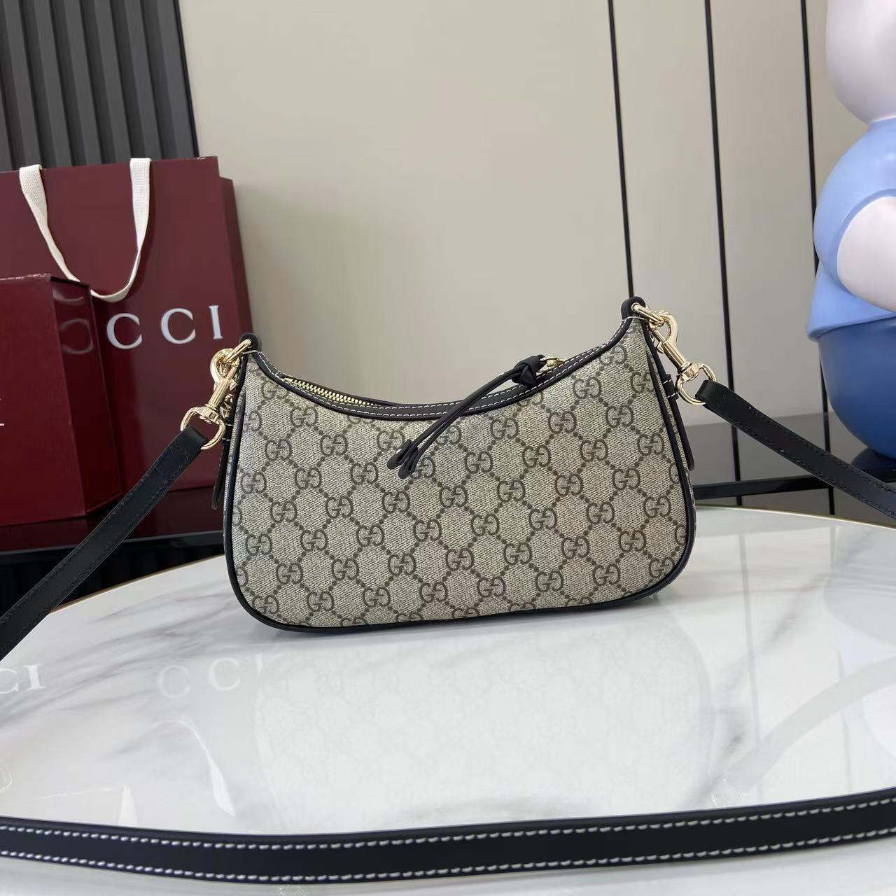 Gucci Emblem small shoulder bag with chain