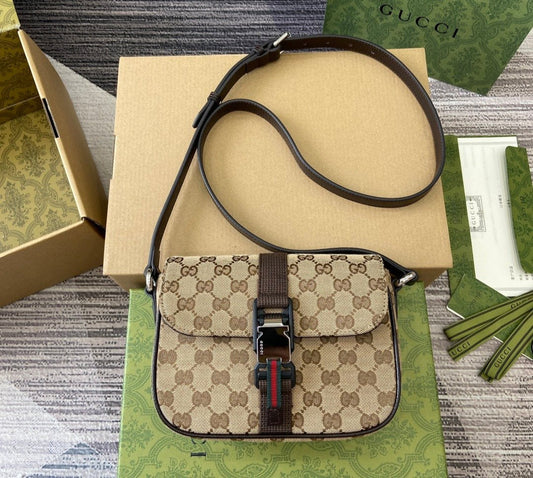 Gucci MINI GG CROSSBODY BAG