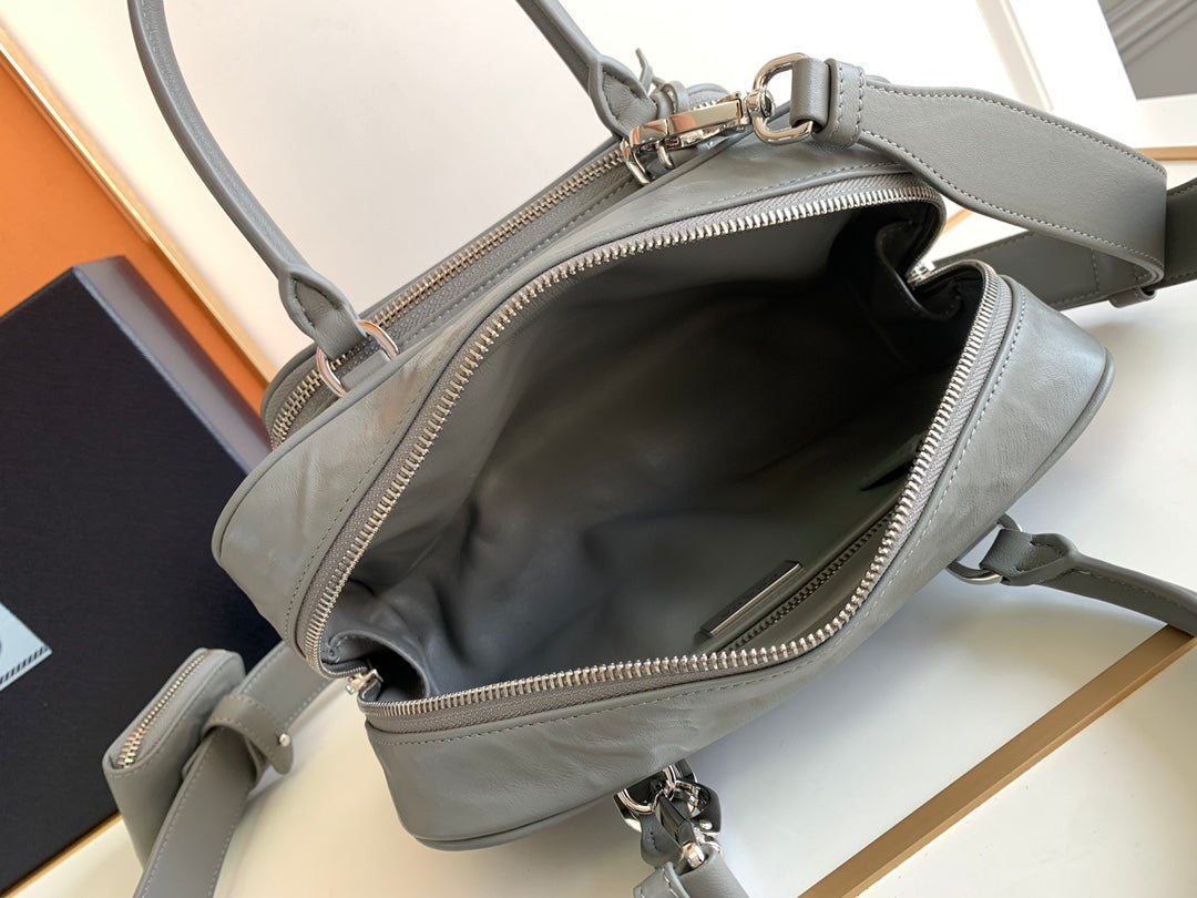 Prada Antique nappa leather multi-pocket top-handle bag
