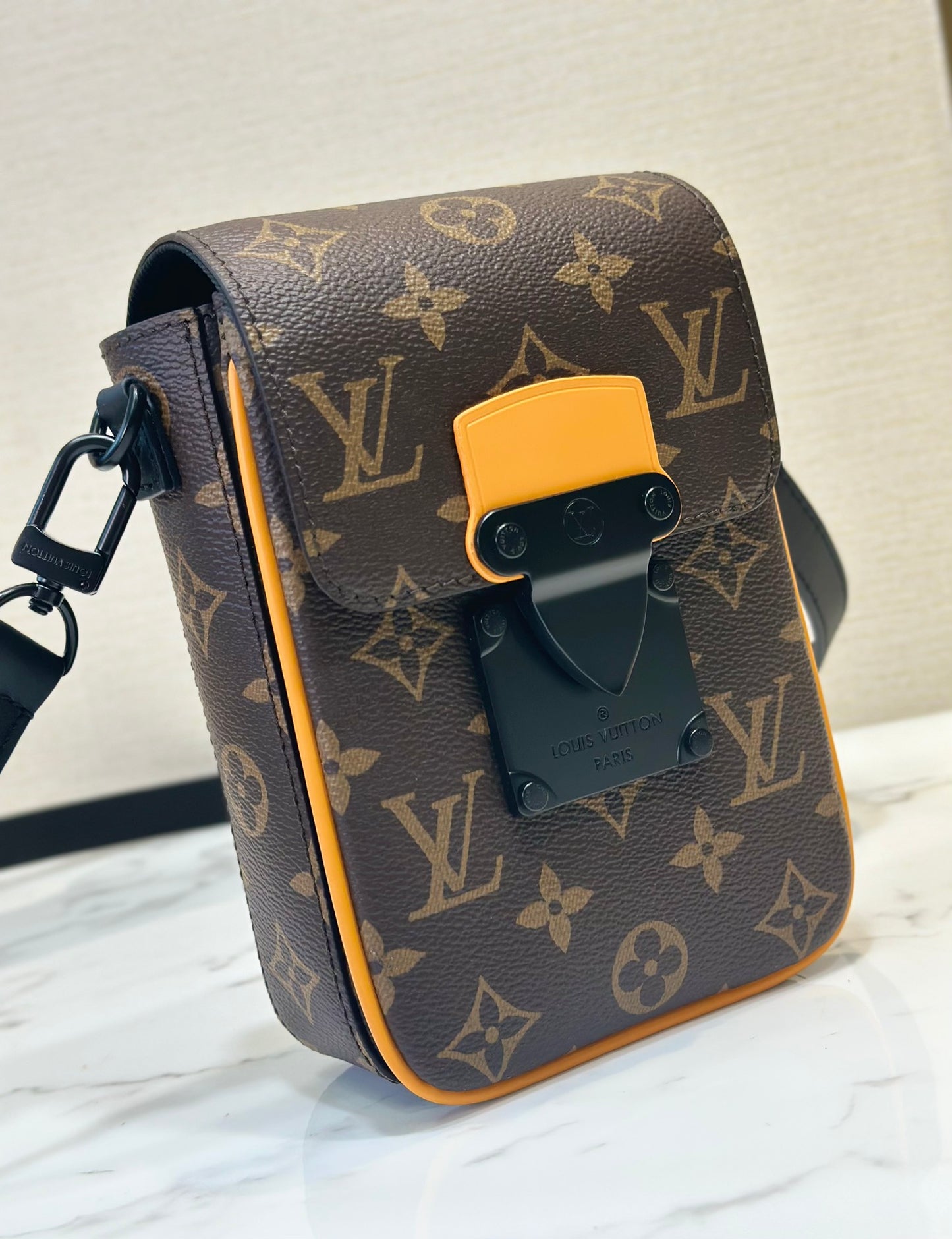 Louis Vuitton S-Lock Vertical Wearable Wallet