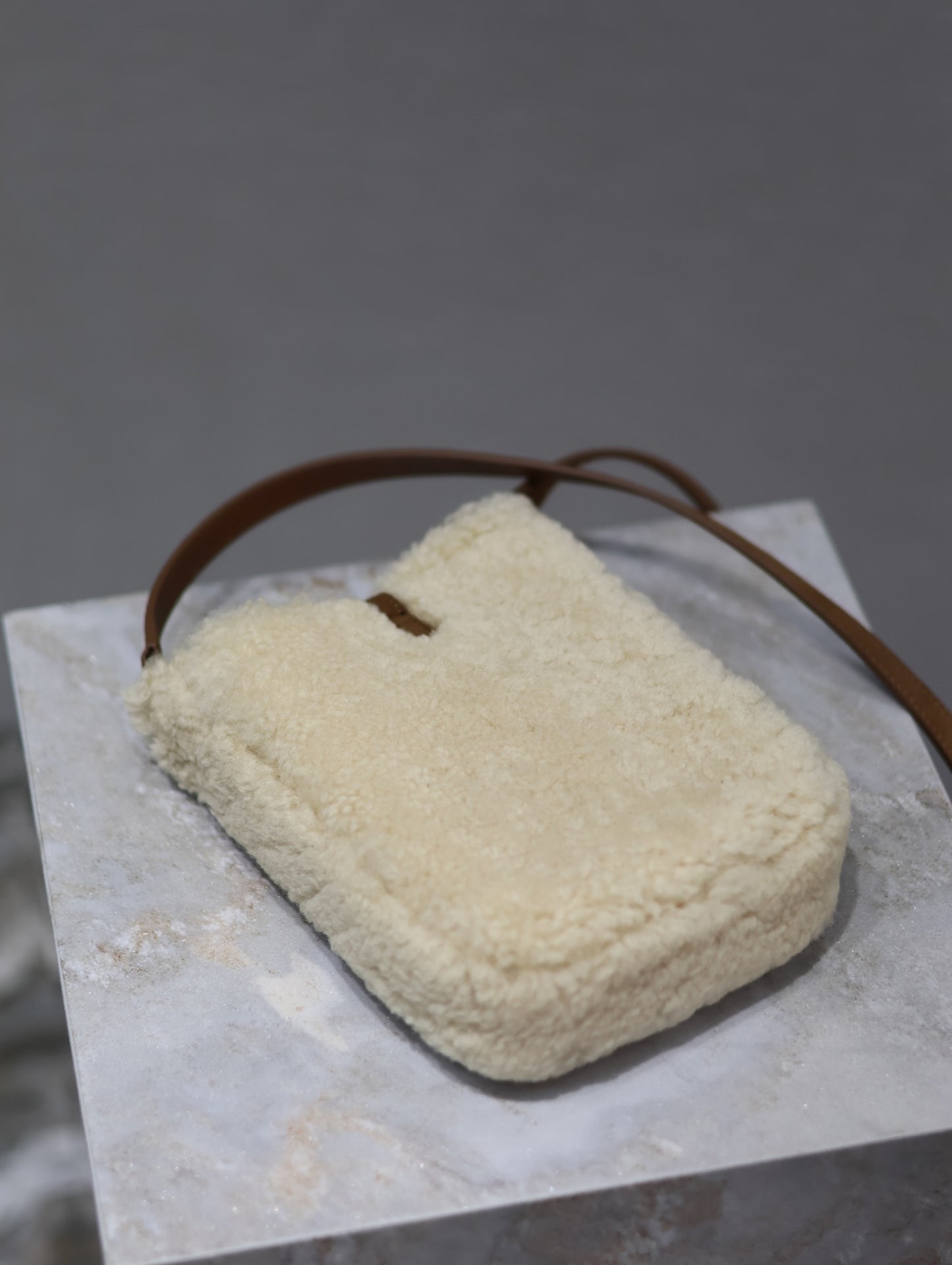 YSL Le 5 A 7 Shearling bag