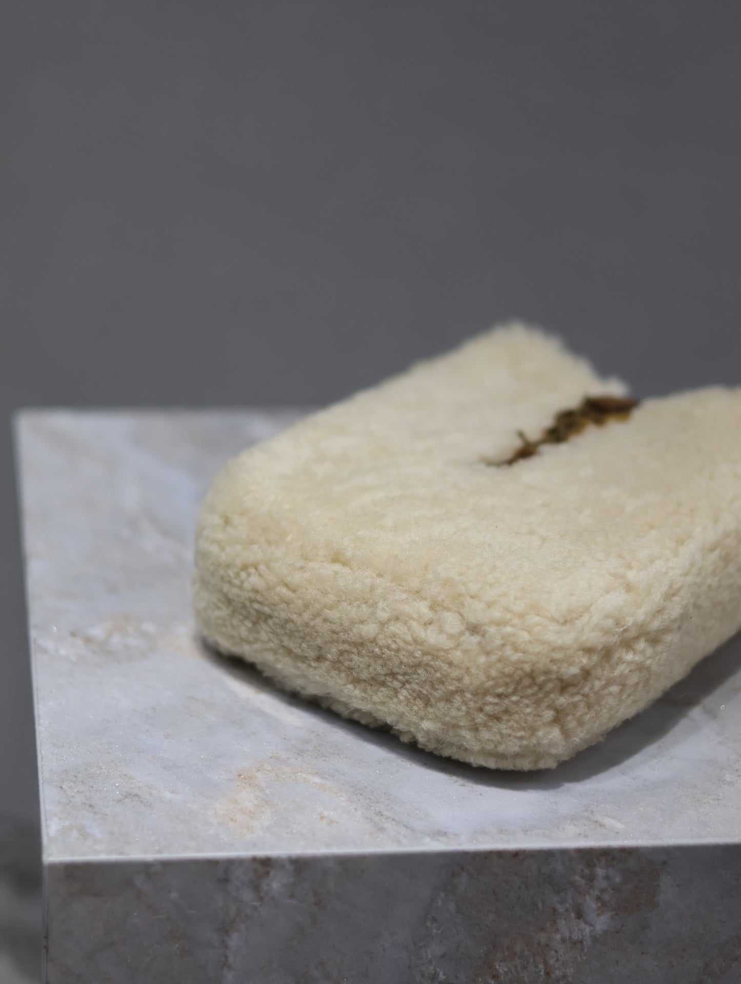 YSL Le 5 A 7 Shearling bag