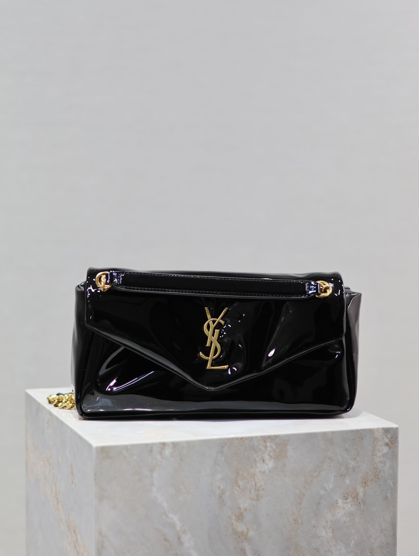 YSL Calypso patent leather bag