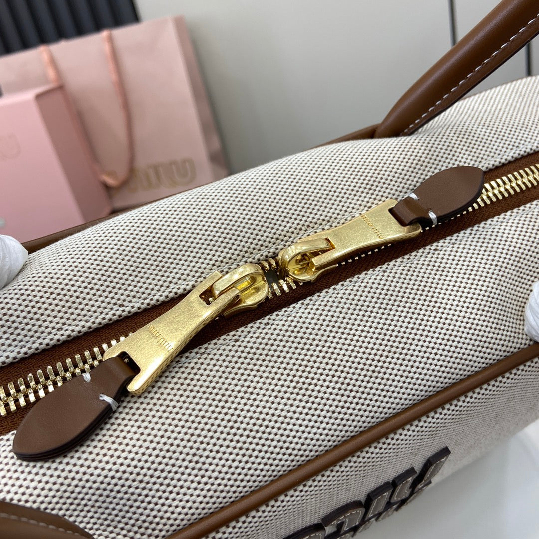 Miu Miu Beau Top handle Canvas bag