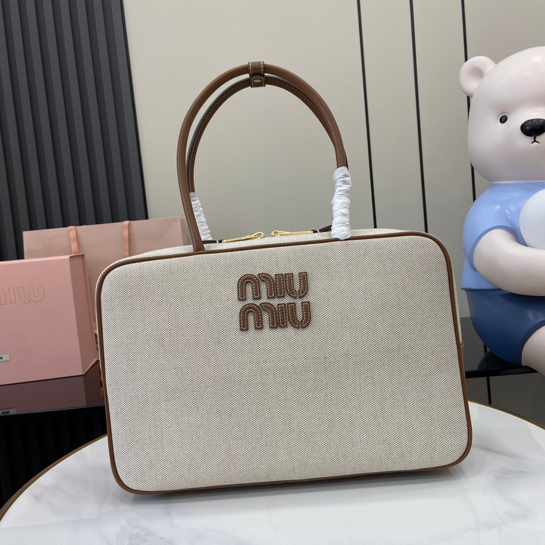 Miu Miu Beau Top handle Canvas bag