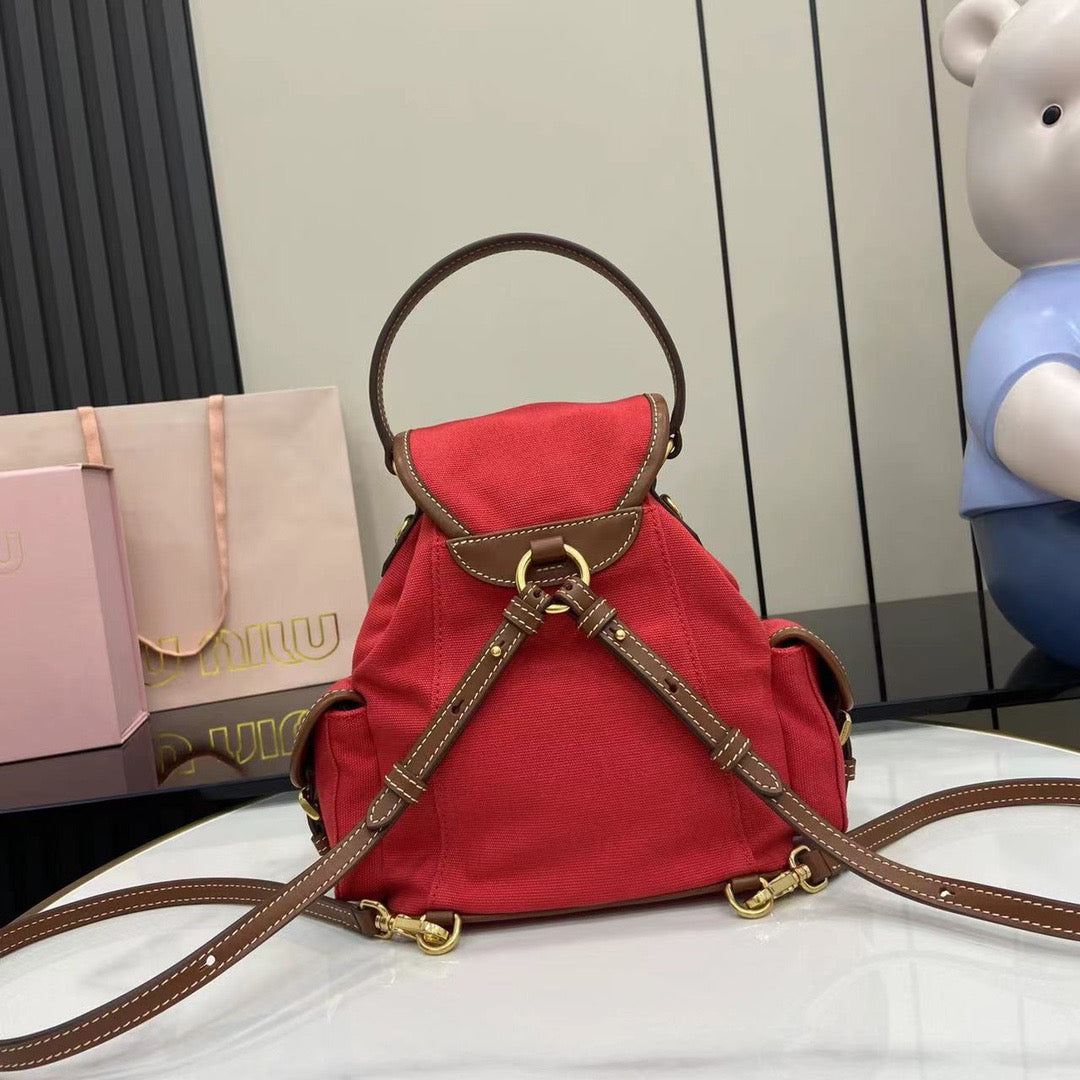 Miu Miu Canvas and leather backpack