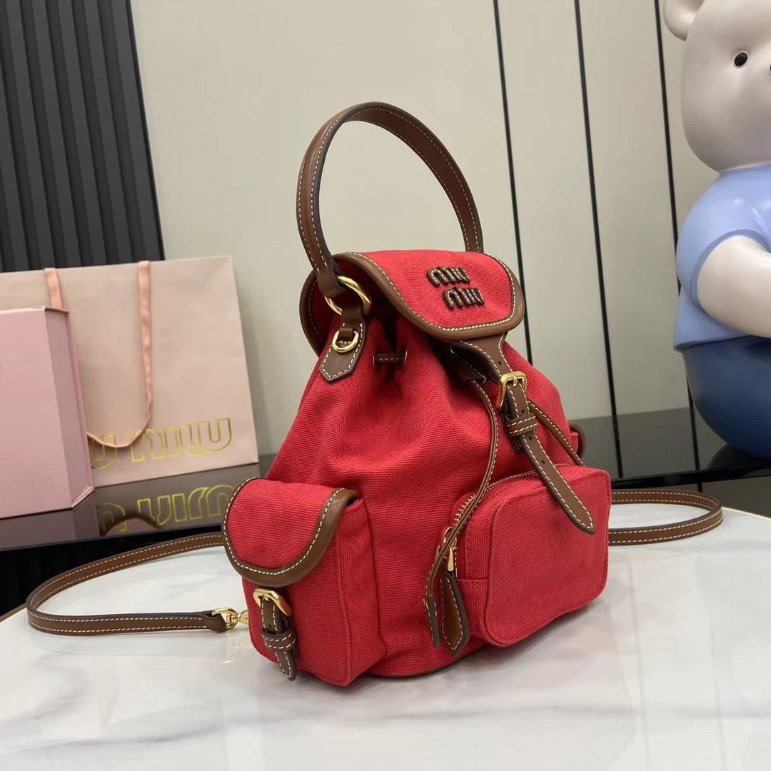Miu Miu Canvas and leather backpack
