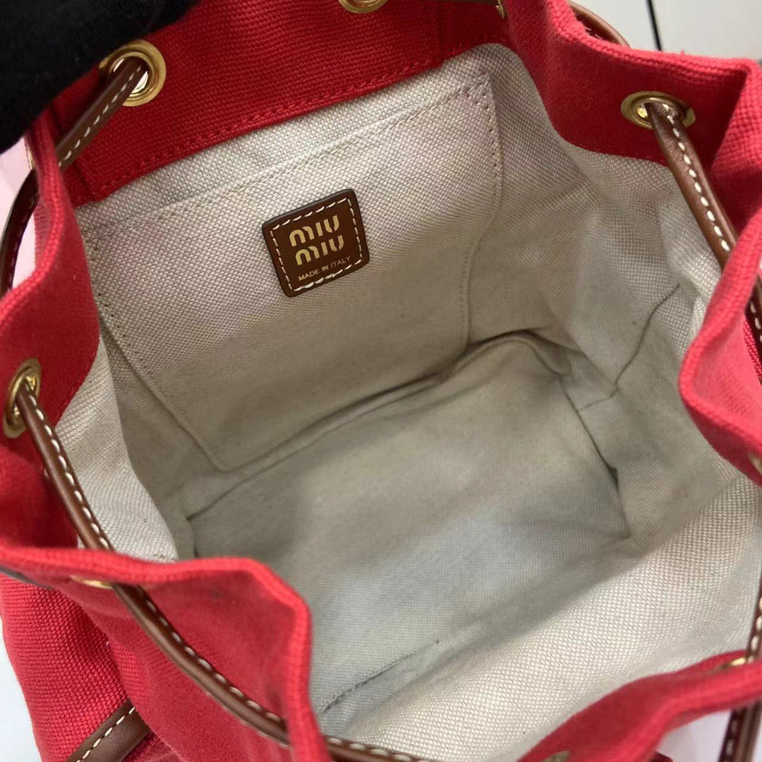 Miu Miu Canvas and leather backpack