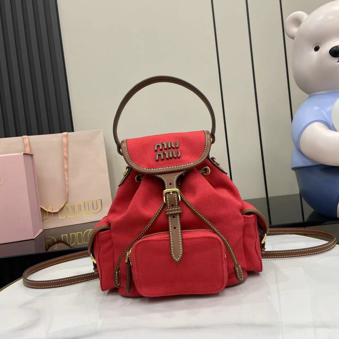 Miu Miu Canvas and leather backpack