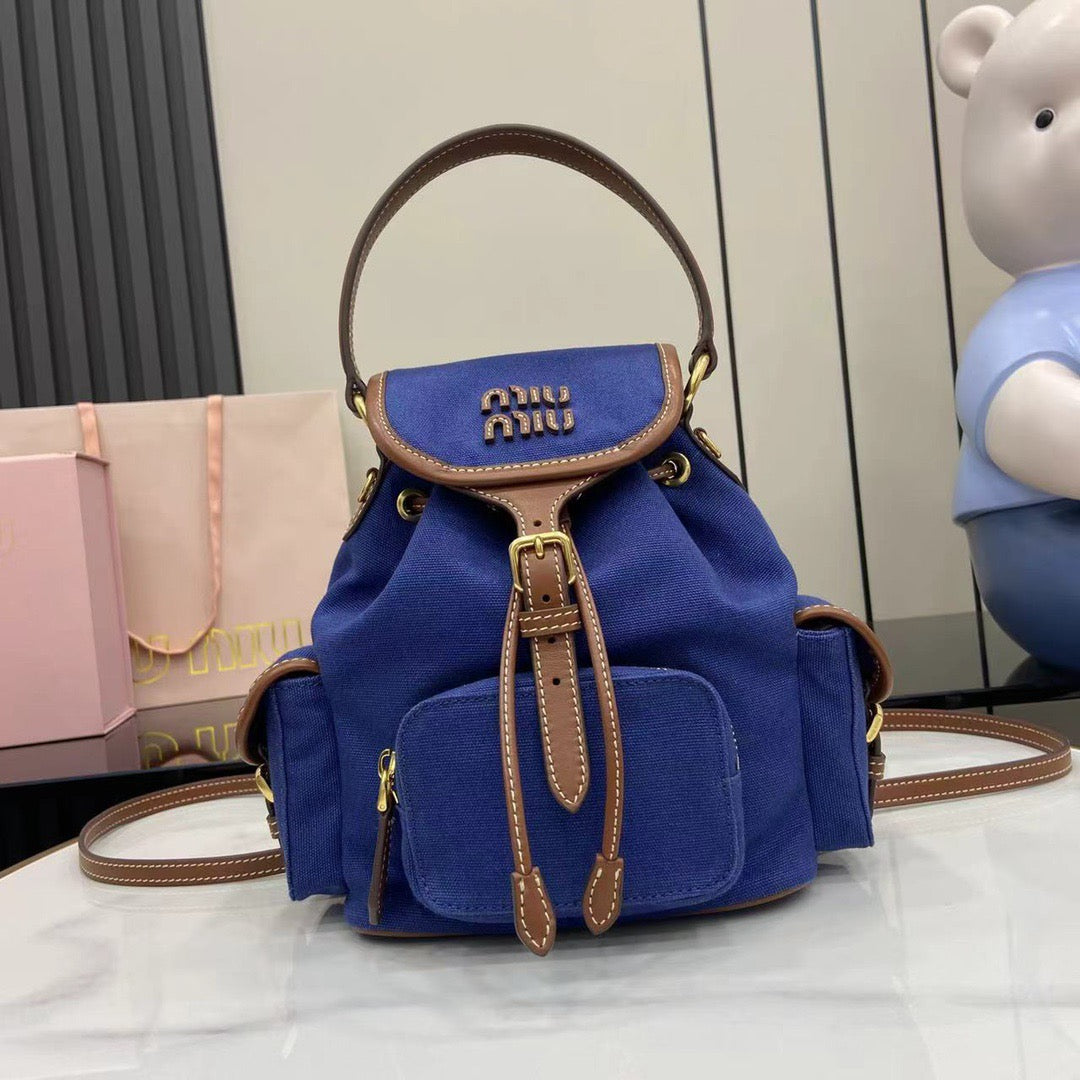 Miu Miu Canvas and leather backpack