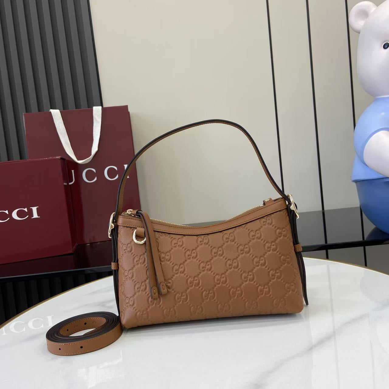 Gucci GG Emblem small shoulder bag