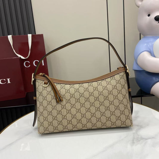 Gucci Medium Emblem Canvas bag