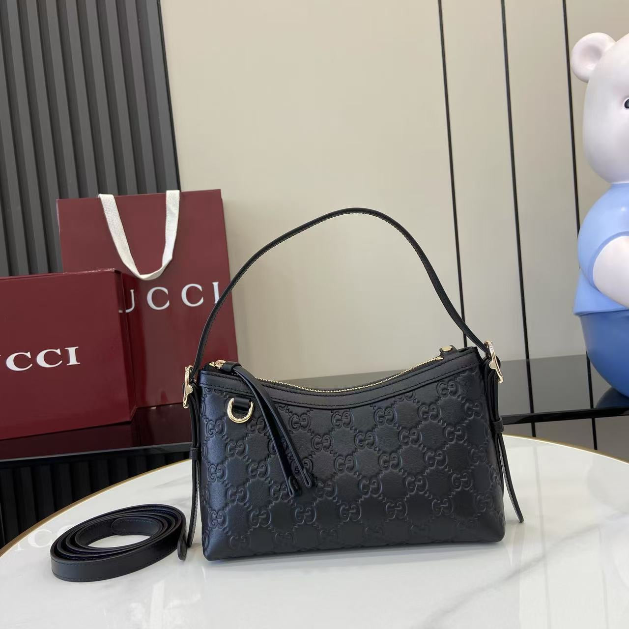 Gucci Small Emblem leather bag